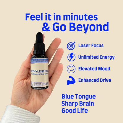Hand holding VitaBlue Methylene Blue bottle with text highlighting benefits such as laser focus, unlimited energy, elevated mood, and enhanced drive on a beige background